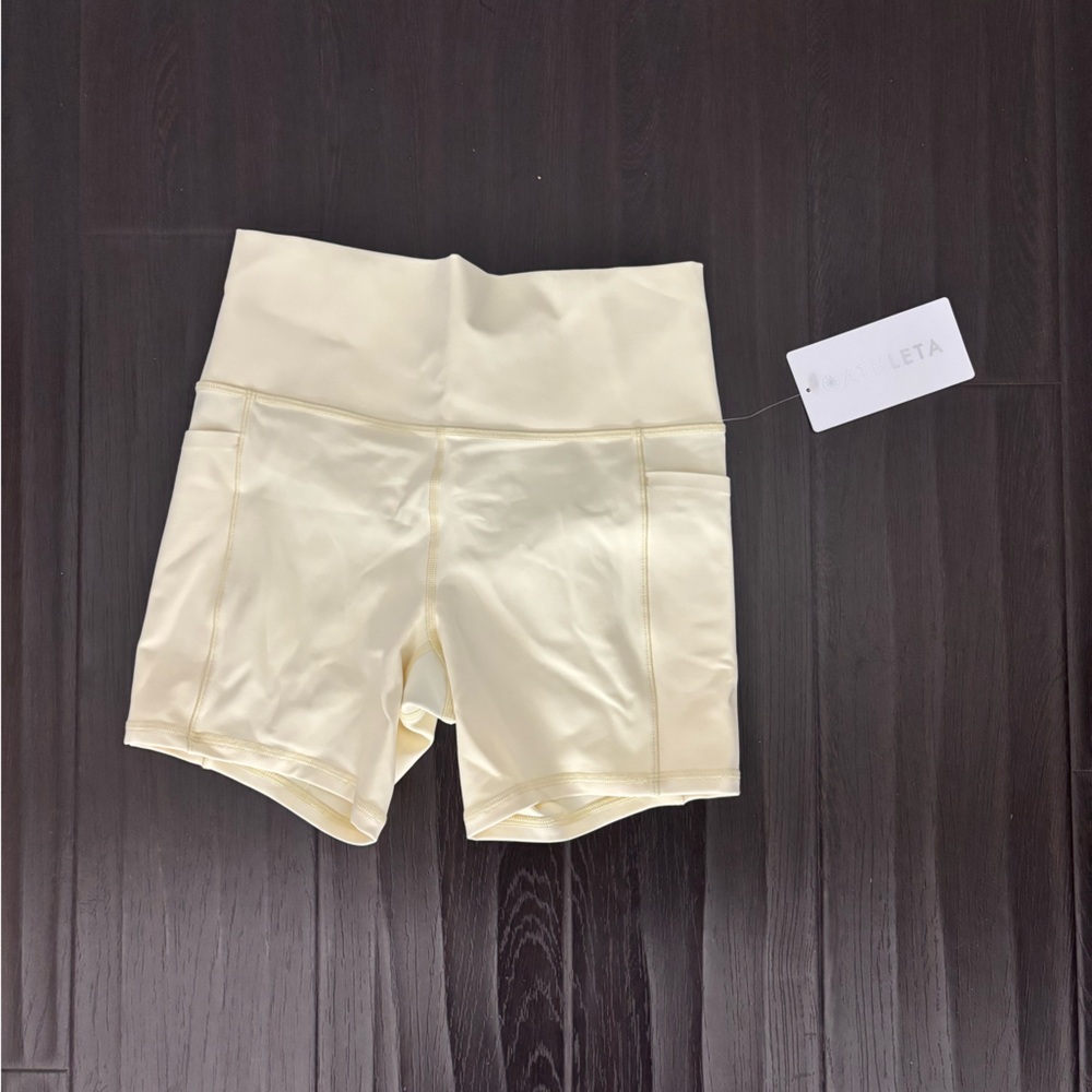 NWT Athleta bike shorts - Butter yellow - Medium